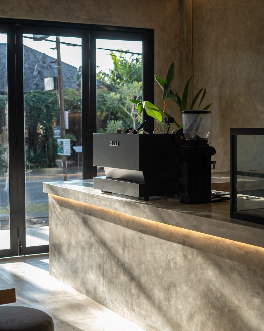GRND Cafe seating with plant wall
